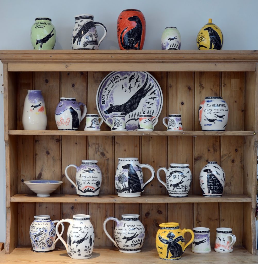 Olley Pottery is selling original ceramics online with Etsy - this image shows a dresser with a display of Olley Pottery's original work